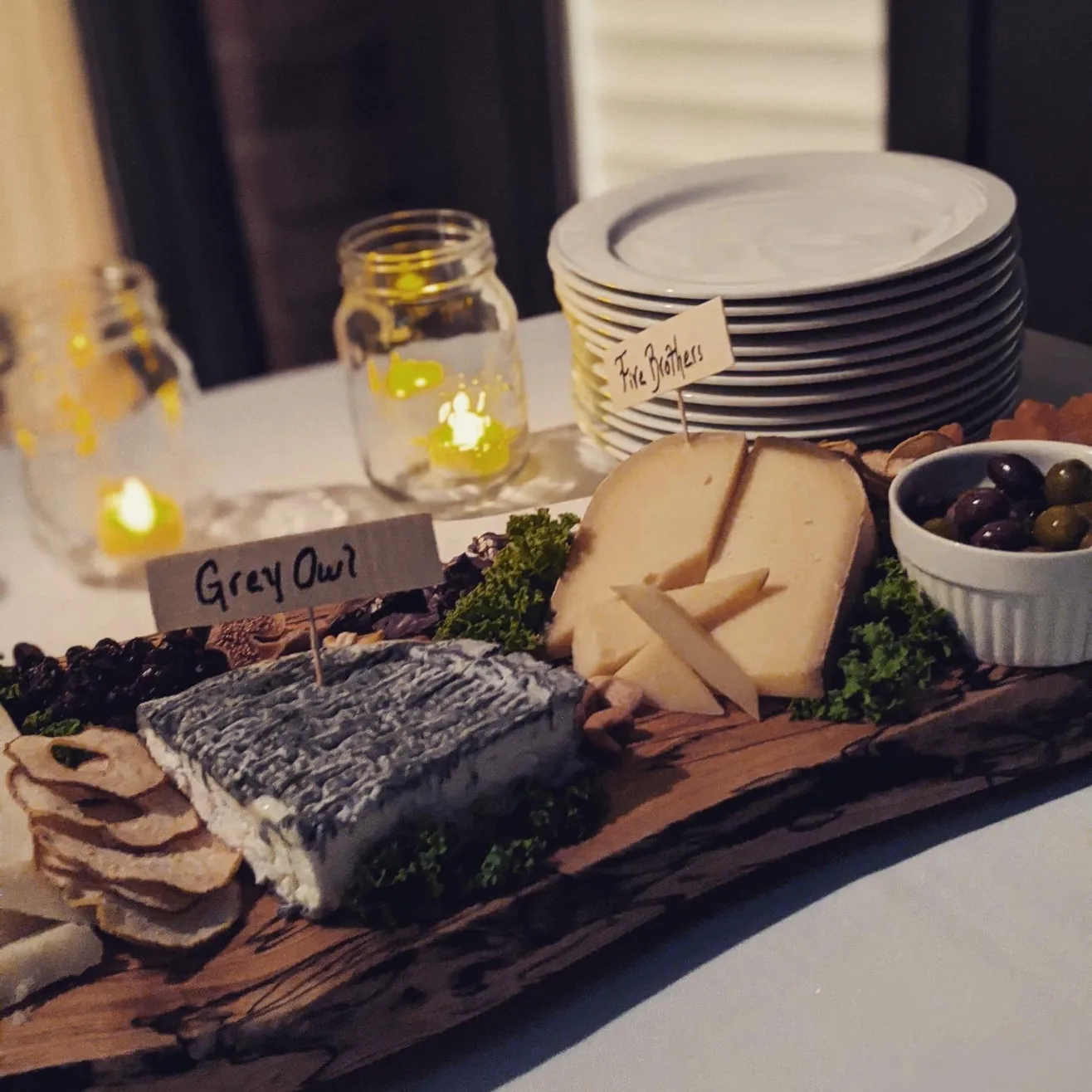 Grey Owl and other cheeses on a party board